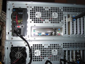 Install SFF-8088 cable between the Norco RPC-4220 DAS/ SAS Expander Enclosure and main server