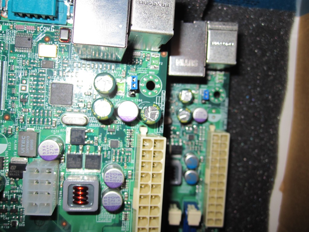A capacitor removed on the X8SIL-F rev 1.02 PCB compared to the 1.01