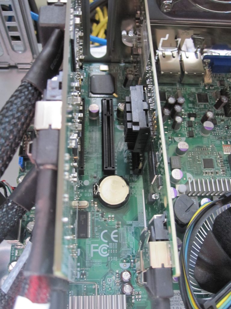 Intel SASUC8I installed in a Supermicro X8SIL-F and connected to a HP SAS Expander