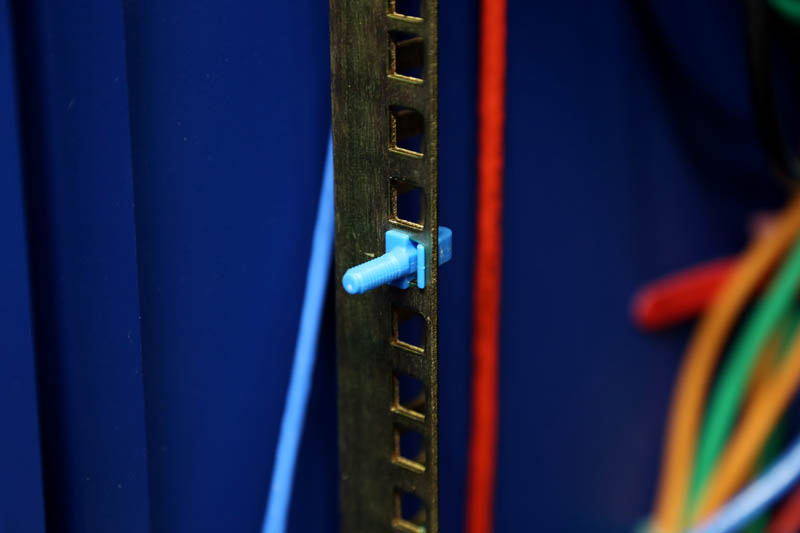 Blue RackStuds Post in datacenter rack