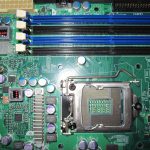 Supermicro X8SIL-F has no blocks of VRMs with large heatsinks onboard