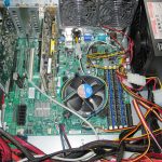 Supermicro X8SIL-F next to the HP-SAS Expander and PCMIG setup with both power supplies