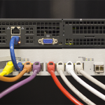 D-Link DXS-1210-12TC being setup in rack