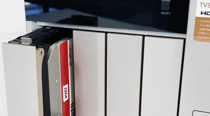 Powerful QNAP TVS-473 Turbo 4-Bay vNAS – Part 1 – Overview QNAP TVS 473 Inserting Hard Drive