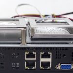 Supermicro AS E301 9D 8CN4 Storage Area With Two Intel SSDs Rear View