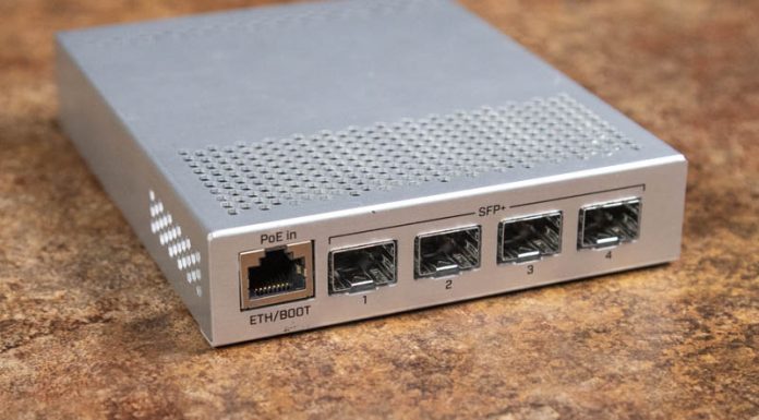 MikroTik CRS305-1G-4S+IN Review 4-Port Must-Have 10GbE Switch MikroTik CRS305 1G 4S IN Front