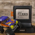 AMD Ryzen Threadripper 3990X Front In Package With Lego Monster Truck