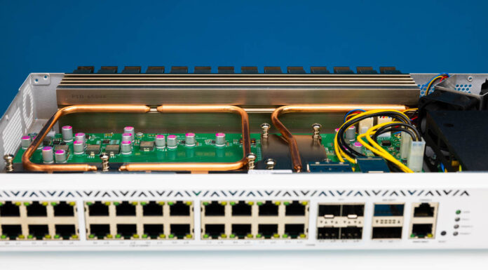 MikroTik CRS326-4C+20G+2Q+RM Switch Review 2.5GbE 10GbE and 40GbE MikroTik CRS 326 4C+20G+2Q+RM Front Open Ports