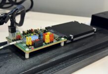 Kioxia AIO Core and Kyocera Develop PCIe Gen5 Over Optics SSD Kioxia Optical SSD Demo FMS 2024 2