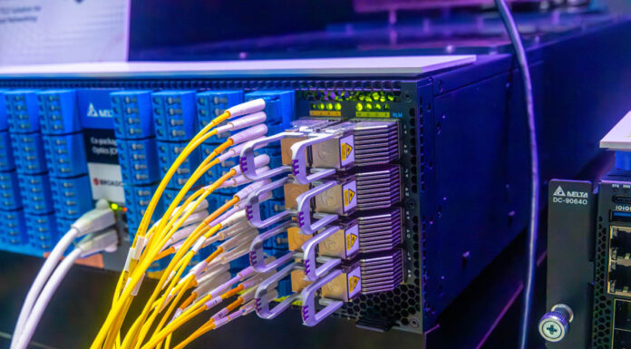 Delta Shows Broadcom 128-port 400GbE Co-Packaged Optics Switch with Pluggable Light Sources Delta DD S64C80 Broadcom BCM78909 CPO At OCP Summit 2024 3