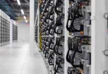 Anthropic Signs SpaceX Colossus 1 Data Center to Boost Capacity XAI Colossus Data Center Supermicro Liquid Cooled Nodes Low Angle