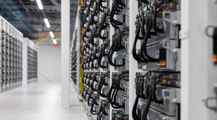 US HPC and the DOGE Impact on Next-Gen Supercomputers XAI Colossus Data Center Supermicro Liquid Cooled Nodes Low Angle