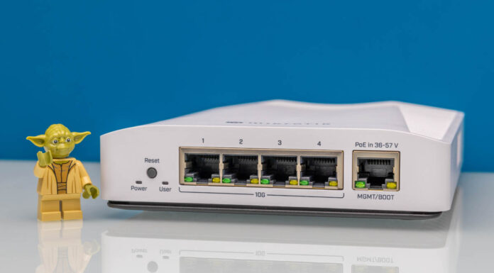 MikroTik CRS304-4XG-IN Review This is a Must-Have 10Gbase-T Switch MikroTik CRS304 4XG IN Front Angle 1