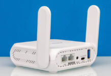 ASUS RT-BE58 Go Portable WiFi 7 Router Review ASUS RT BE58 Go BE3600 Dual Band Wi Fi Router Rear Angled 3