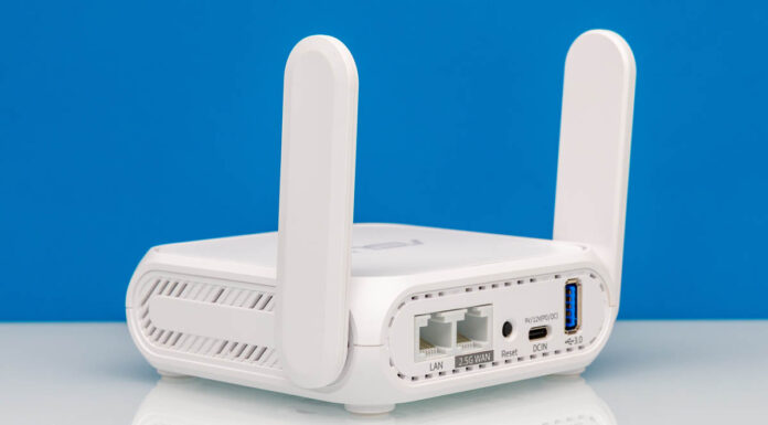 ASUS RT-BE58 Go Portable WiFi 7 Router Review ASUS RT BE58 Go BE3600 Dual Band Wi Fi Router Rear Angled 3