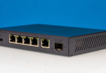 UGREEN UM106X CM753 5-port 2.5GbE 1-port 10G Switch Review UGREEN CM753 Front Angled 1