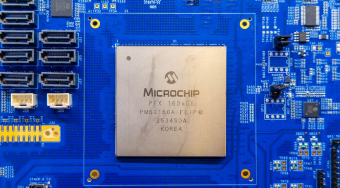 Microchip Switchtec 160-Lane PCIe Gen6 Switch Shown at FMS 2026 with XpressConnect PCIe 6 Retimer Microchip Pfx 160Xg6 Chip 1